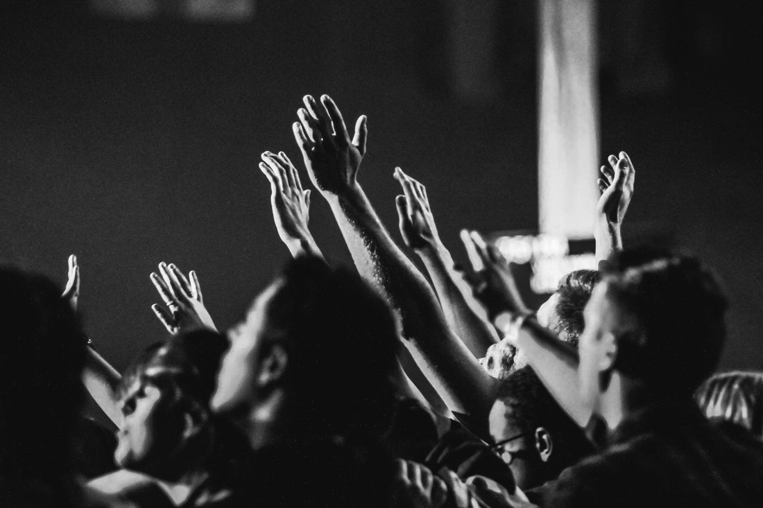 Photo by Shelagh Murphy: https://www.pexels.com/photo/grayscale-photo-of-people-raising-their-hands-1666816/