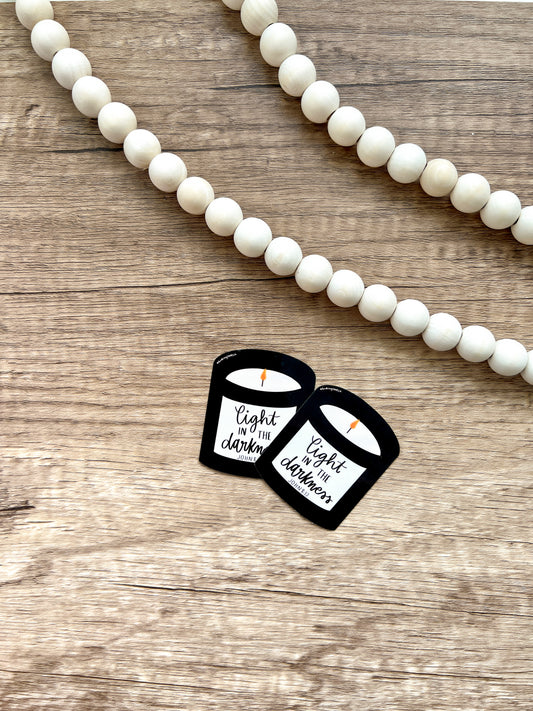 Vela de luz en la oscuridad Pegatina